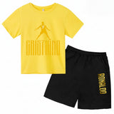 Yellow t-shirt with 'Grisiano' and black shorts with 'Ronaldo' on a white background