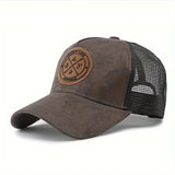 Brown trucker cap with a leather patch on a white background