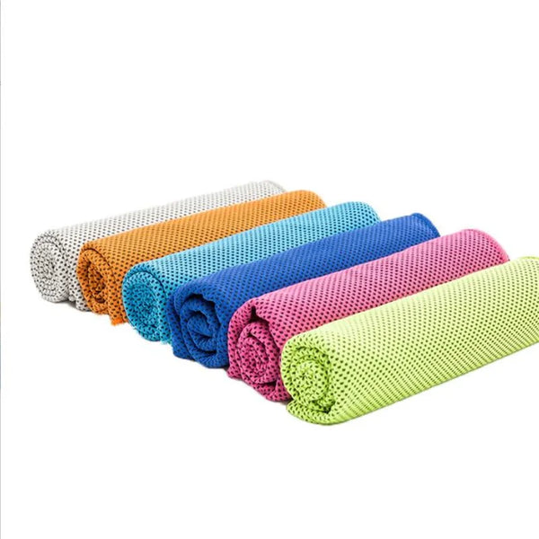 Set of colorful rolled-up towels on a white background