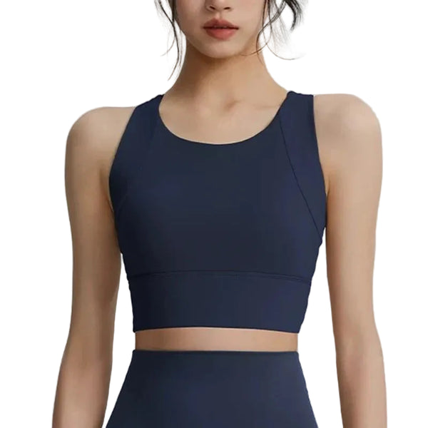 Navy blue sports bra worn by a person on a light gray background