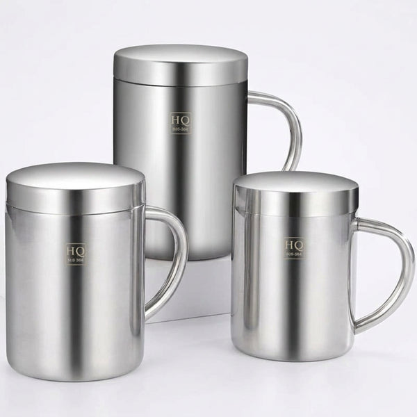 Three stainless steel mugs with 'HQ' branding on a dark surface.