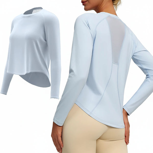 Light blue long-sleeve top worn by a model on a white background