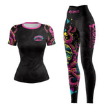 Black athletic shirt and leggings with colorful designs and 'Cody's' branding on a white background