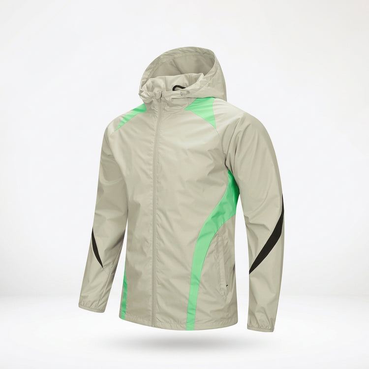 Light gray jacket with green accents and black details on a white background, featuring the Kelme brand logo.