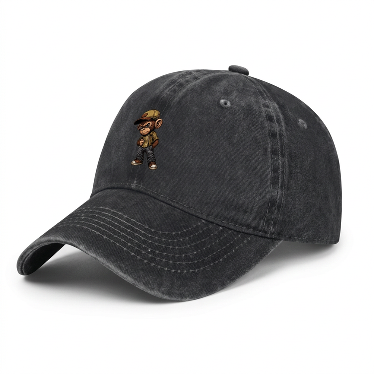 Black washed baseball cap with cartoon monkey graphic on a white background